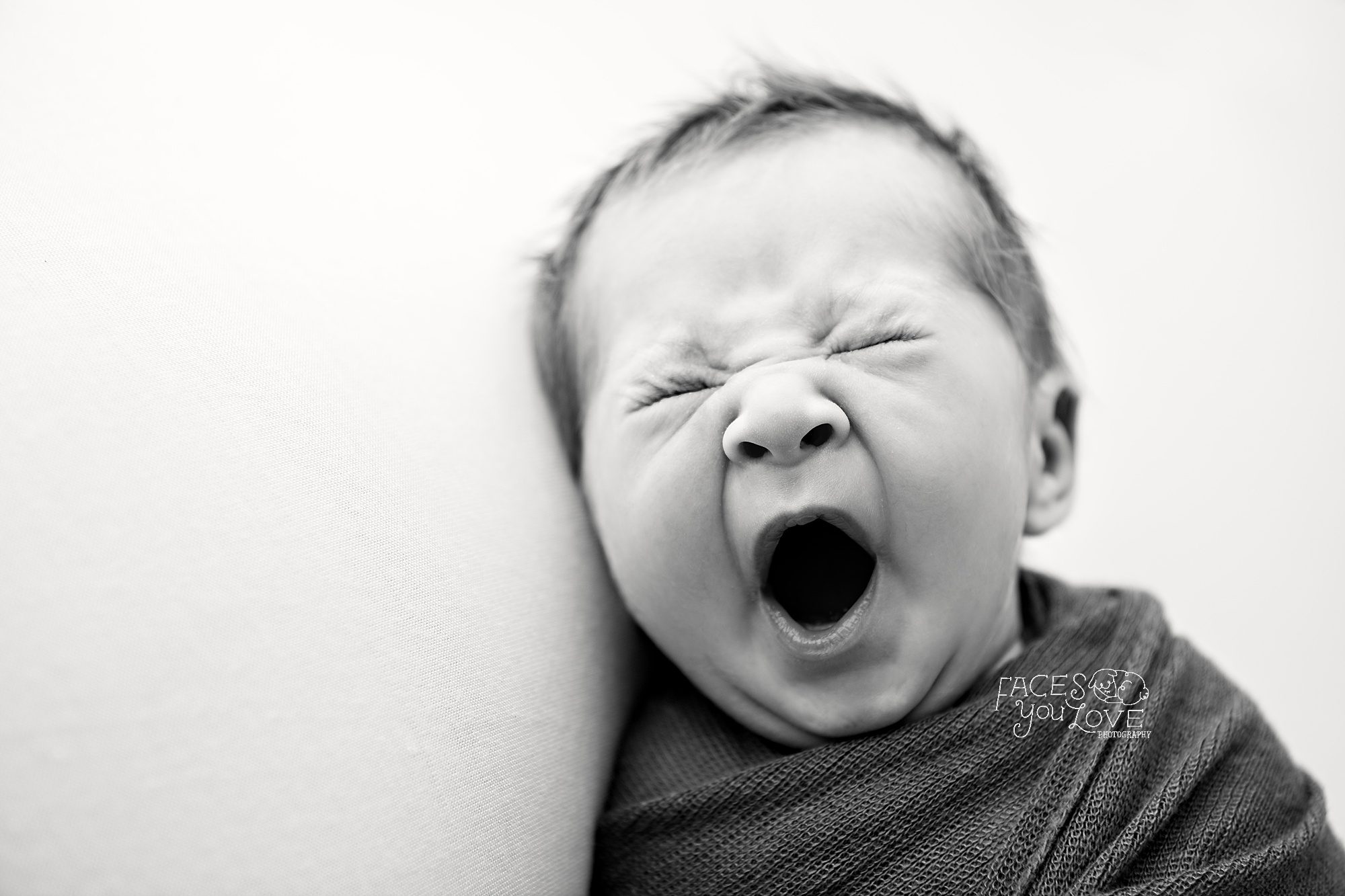 baby yawn, newborn yawning, black and white newborn, Kansas City photographers, newborn photographer Kansas City 